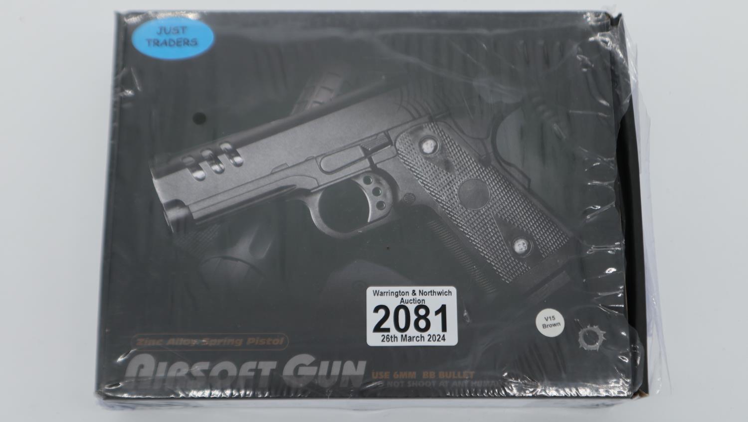 New old stock airsoft pistol, model V15 in brown, boxed and factory sealed. UK P&P Group 1 (£16+