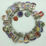 Silver charm bracelet with forty charms, 60g. UK P&P Group 1 (£16+VAT for the first lot and £2+VAT