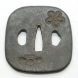 Japanese iron tsuba with decoration in relief and signed. UK P&P Group 1 (£16+VAT for the first