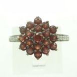 9ct gold cluster ring set with red stones and diamonds, size P, 2.9g. UK P&P Group 0 (£6+VAT for the