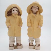 Two Stormy Weather Girls in Raincoats by Austin Productions, no cracks or chips, H: 42 cm. UK P&P