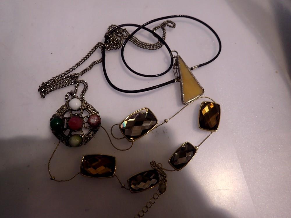 Four necklaces, including a Scottish hardstone example. UK P&P Group 1 (£16+VAT for the first lot