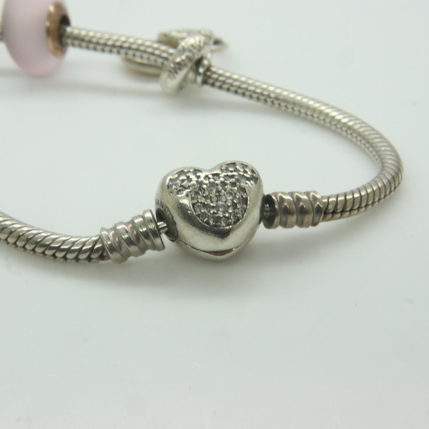 Pandora Disney bracelet with five Disney charms, with box and bag, L: 18 cm. UK P&P Group 1 (£16+VAT - Image 2 of 2