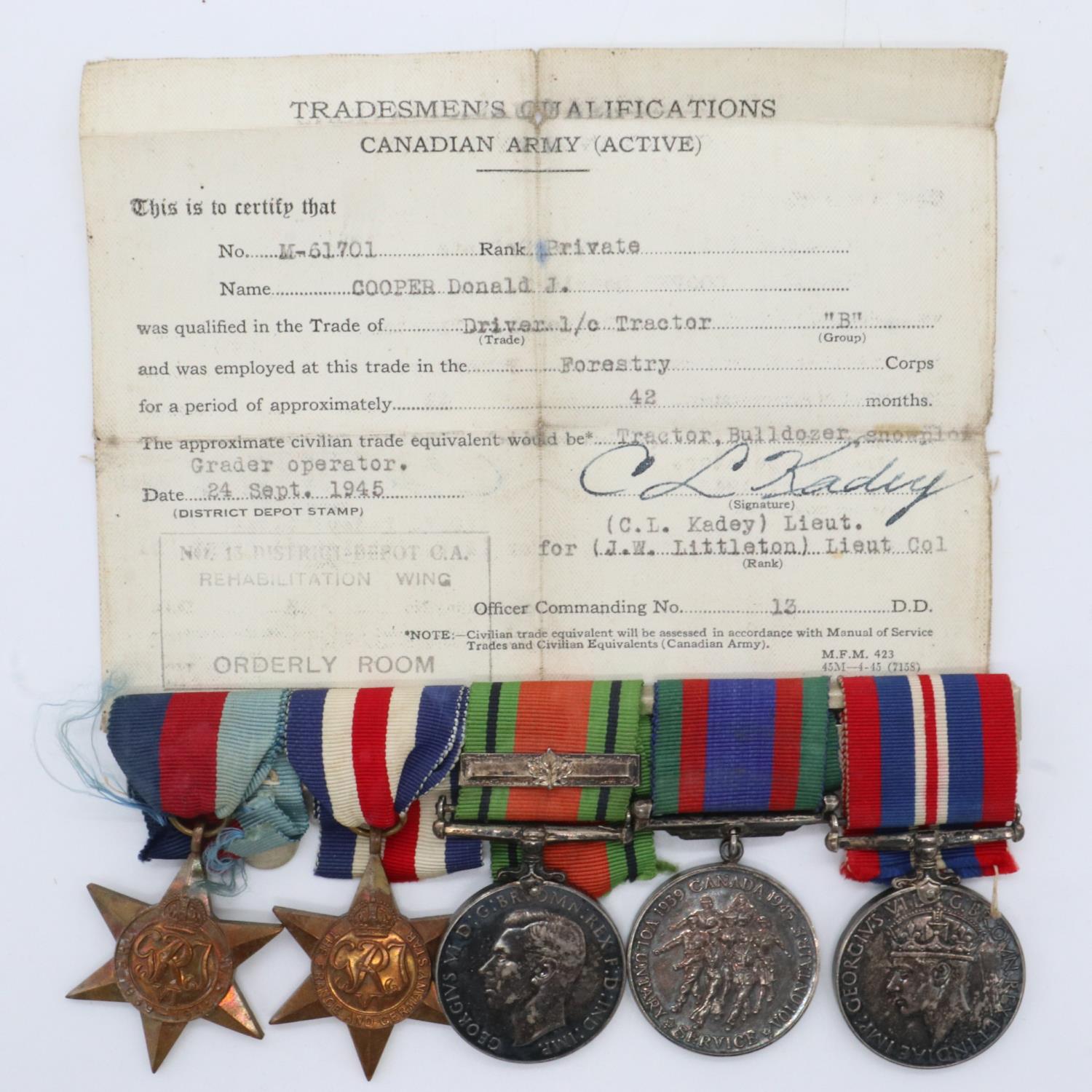 Canadian WWII medal group to M-61701 Pte D J Cooper, comprising BWM, Defence medal, Volunteer