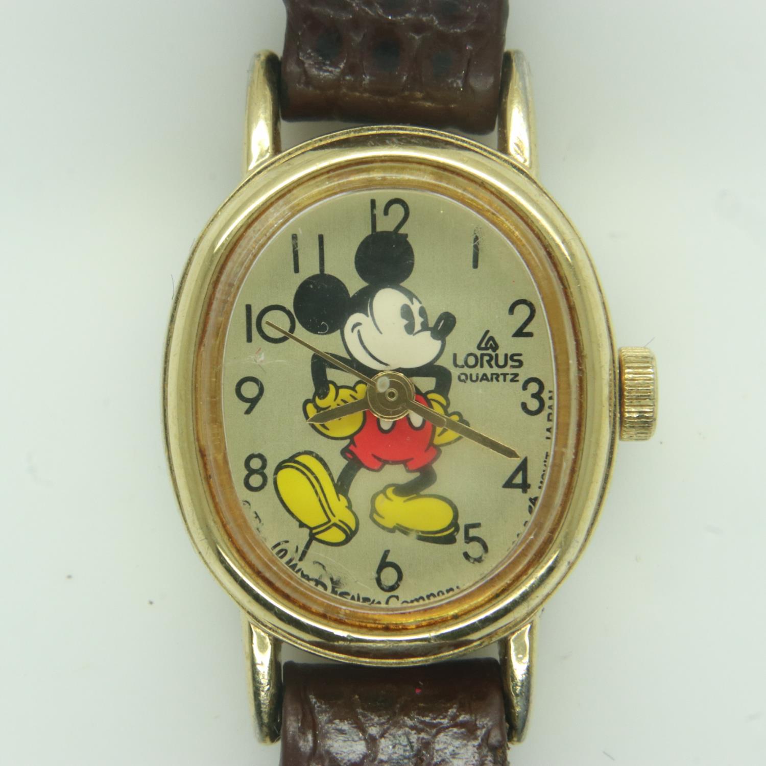 LORUS: 1990 official Disney World Florida ladies wristwatch on a brown leather strap, requires