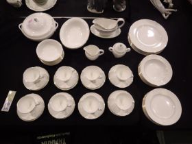Eight person Signet Gold Wedgwood dinner service, 63 pieces. Not available for in-house P&P