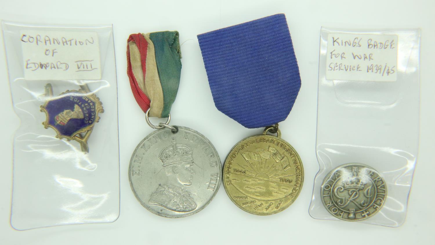 Edward VIII commemorative medal and enamelled badge, a further medal and a WWII War Service