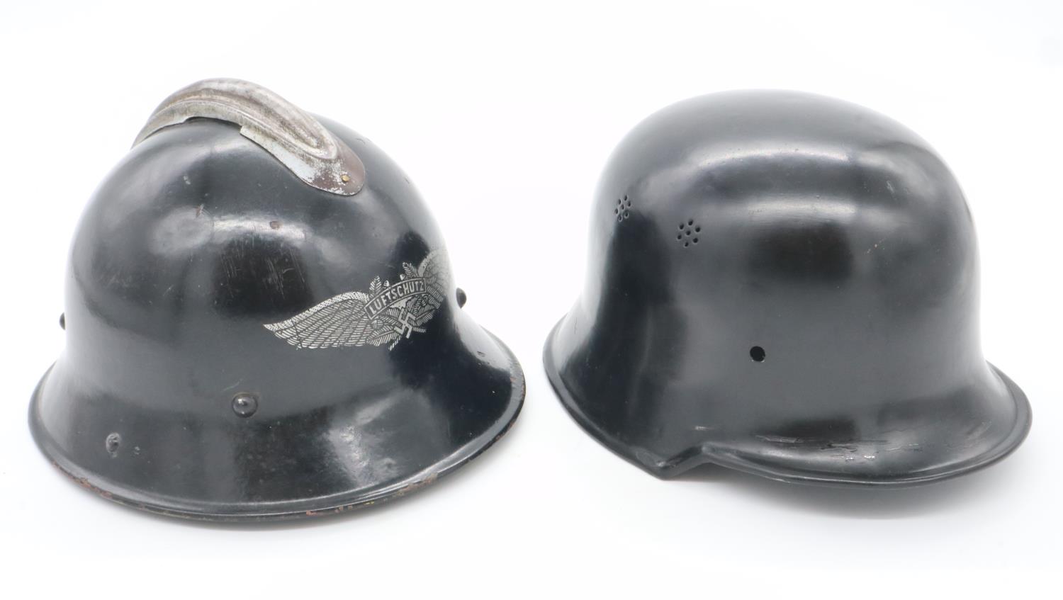 German WWII period Luftschutz enamelled steel helmet with liner, together with a later replica SA