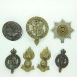A quantity of British WWI-II cap badges. UK P&P Group 1 (£16+VAT for the first lot and £2+VAT for