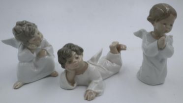 Three Lladro cherubs, largest H: 15 cm, no cracks or chips. UK P&P Group 3 (£30+VAT for the first