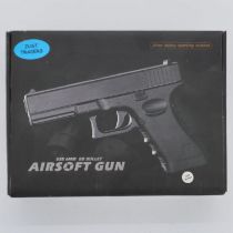 New old stock airsoft pistol, model V20 in brown, boxed and factory sealed. UK P&P Group 1 (£16+