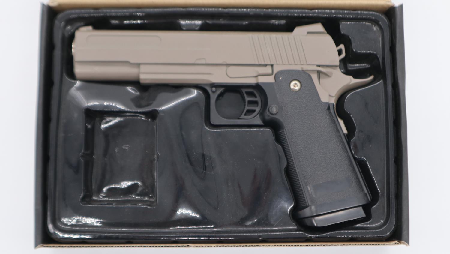 New old stock airsoft pistol, model V19 in tan, boxed. UK P&P Group 1 (£16+VAT for the first lot and - Image 2 of 2