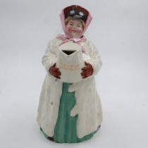 Benzin, rare early ceramic motoring jug in the form of a lady motorist carrying a petrol dispenser