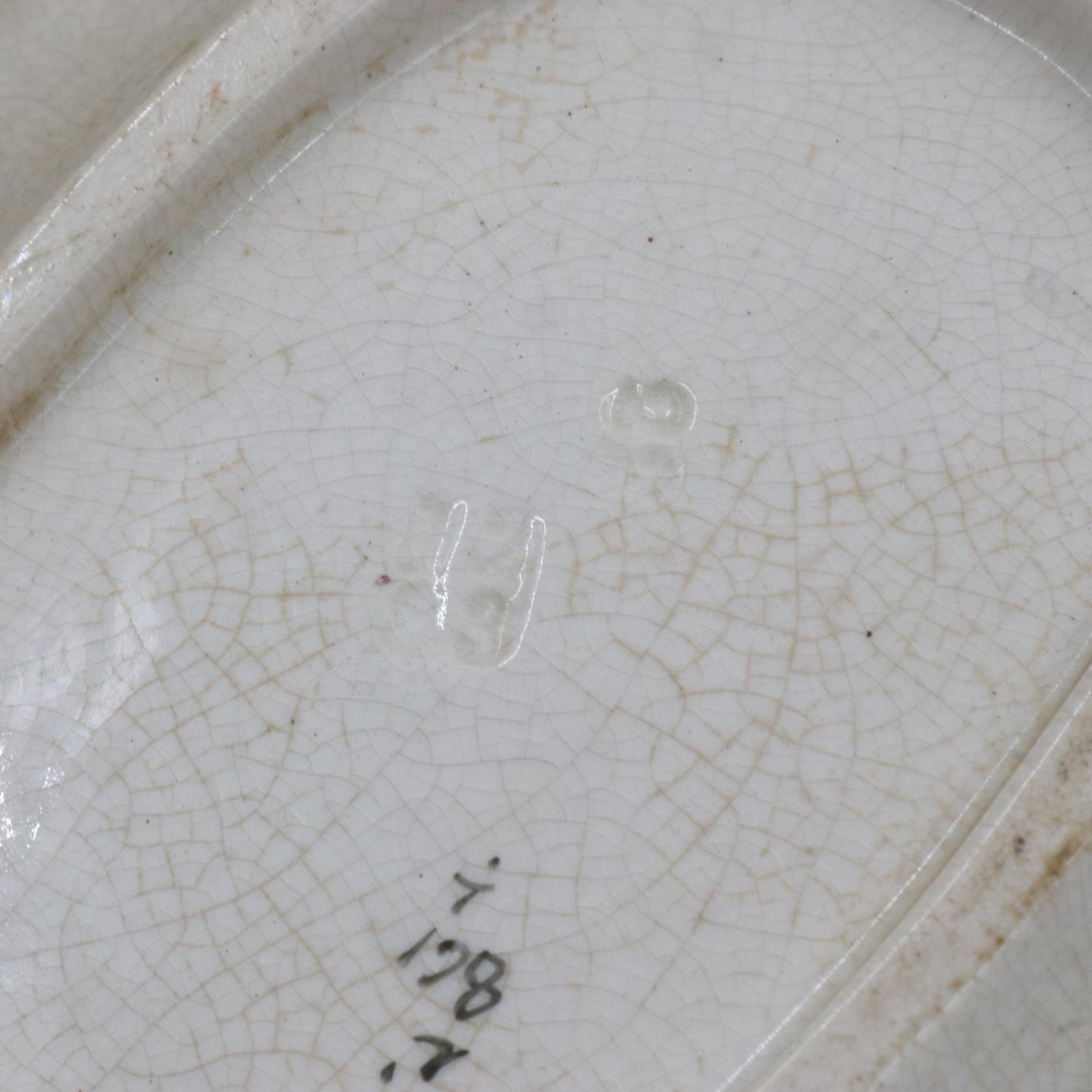 Nine relief moulded fish plates, one platter and one sauce bowl with stand, crazing and some cracks, - Image 3 of 4