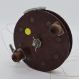 A large vintage bakelite sea rod reel. UK P&P Group 1 (£16+VAT for the first lot and £2+VAT for