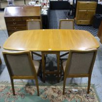 Nathan dining suite, comprising a drop-leaf table (175 x 99 x 175 xm H open) and a set of four
