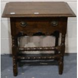 A Victorian oak single drawer lamp table raised on turned supports, 69 x 45 x 70 cm H. Not available