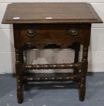 A Victorian oak single drawer lamp table raised on turned supports, 69 x 45 x 70 cm H. Not available