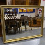 Large contemporary gilt framed bevelled edge mirror, 103 x 130 cm. Not available for in-house P&P