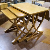 Nathan teak nest of three graduating tables, largest 61 x 43 x 50 cm H. Not available for in-house