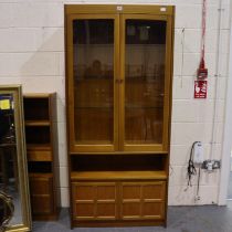 Nathan Squares illuminated display cabinet, two doors and three glass shelves above a two-door