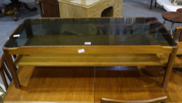 Mid 20th century teak rectangular centre table, with smoked glass top and under-shelf, 112 x 48 x 45