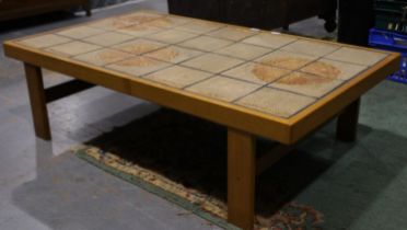 Mid 20th century Danish teak oversized centre table with tiled top, marked Trioh, 147 x 86 x 43 cm