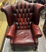 Chesterfield Queen Anne wing chair, in the blood red colourway, H 105 x D 89 x W 88 cm. Not
