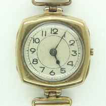 9ct gold ladies wristwatch on a yellow metal bracelet, not working at lotting, total 14.6g. UK P&P