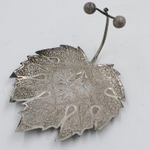 Middle Eastern white metal leaf form dish. UK P&P Group 2 (£20+VAT for the first lot and £4+VAT