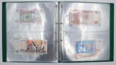 World bank note folder, mostly uncirculated issues. UK P&P Group 2 (£20+VAT for the first lot and £