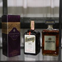 350cl bottle of Courvoisier VSOP cognac, a 70cl bottle of Cointreau and a 50cl bottle of Amaretto.