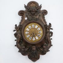 Japy Freres 19th century bronze cased wall clock decorated with koi and masks, lacking bell, H: 55