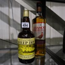Litre bottle of Famous Grouse whisky and a 70 cl bottle of Sheep Dip whisky. Not available for in-