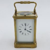 Brass repeating carriage clock, working at lotting, H: 11 cm. UK P&P Group 2 (£20+VAT for the