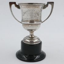 Hallmarked silver trophy on plinth with 1931 engraving, 64g. UK P&P Group 1 (£16+VAT for the first