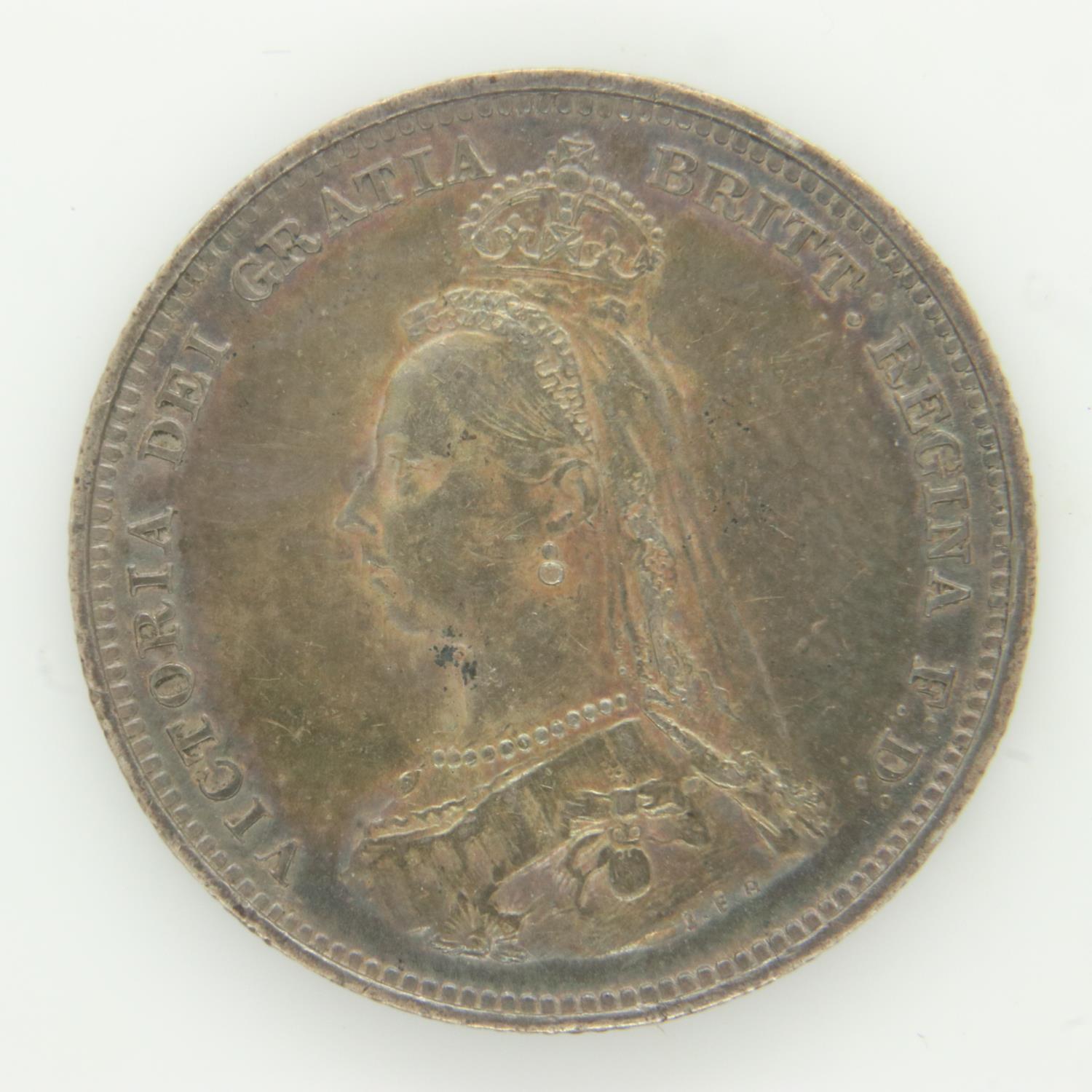 Boxed 1887 silver shilling EF grade with iridescent toning. UK P&P Group 1 (£16+VAT for the first - Image 2 of 2