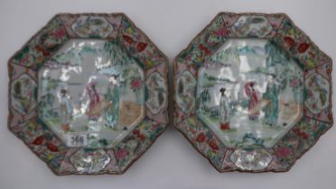 A pair of Japanese 19th century octagonal plates, the border decorated with panels of butterflies