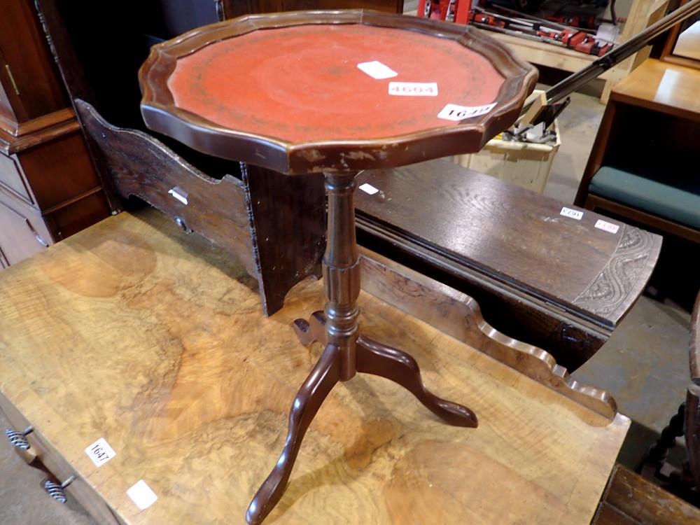 Thai walnut wine table with red leather surface, 51cm H x 33cm L. Not available for in-house P&P