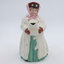 Benzin, rare early ceramic motoring jug in the form of a lady motorist carrying a petrol dispenser