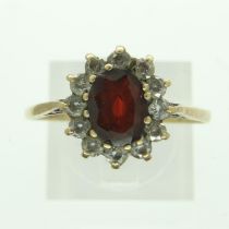 9ct gold ring set with garnet and cubic zirconia, size V, 2.2g. UK P&P Group 0 (£6+VAT for the first
