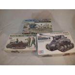 Three 1/35 scale military related kits, Tamiya Marder III tank destroyer, Tamiya Kettenkraftrad, and