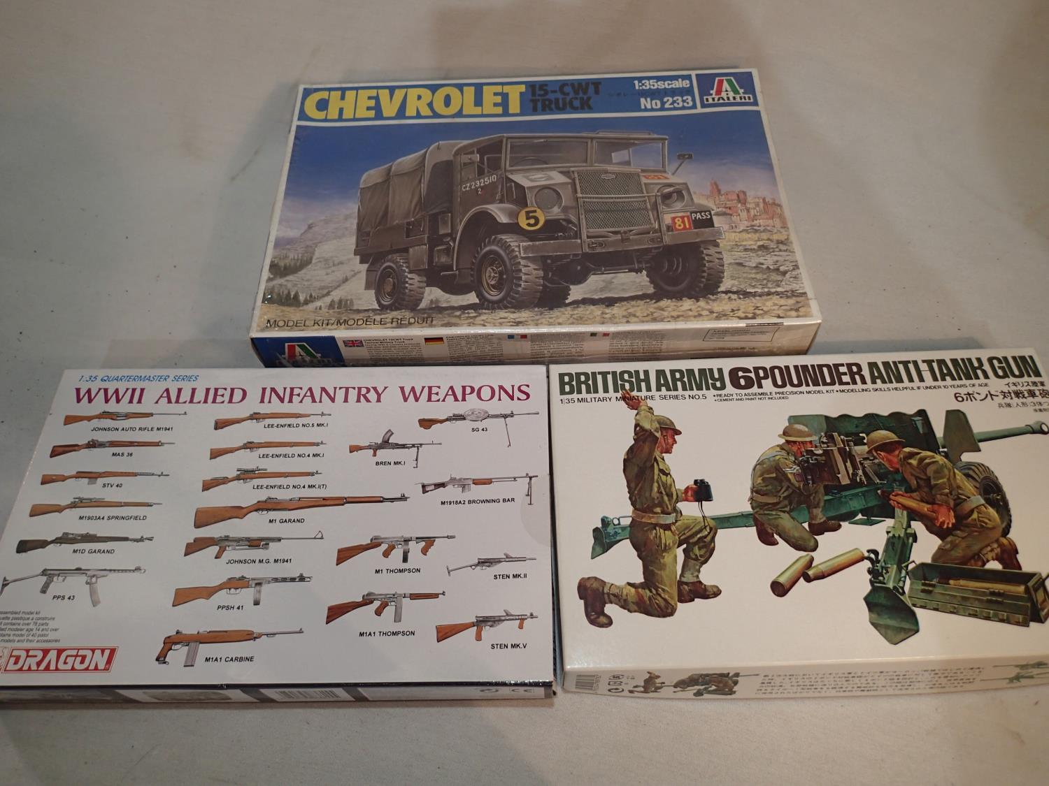 Three 1/35 scale military related kits, Tamiya British 6 pounder anti tank gun, Italeri 15CWT