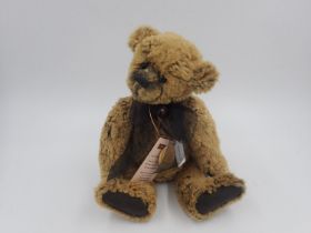 Charlie Bears, Anniversary Thomas, with tag attached, stitch down nose and jointed at limbs. Approx.