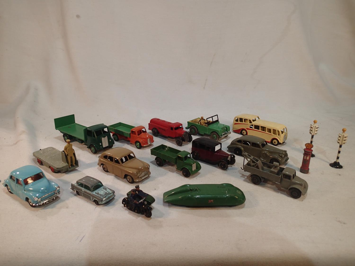 Thirteen Dinky Toys cars and commercials, including early issues, mostly good condition, plus