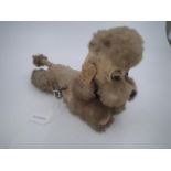 1950's Cragstan clockwork Sleepy Poodle, working. UK P&P Group 1 (£16+VAT for the first lot and £2+