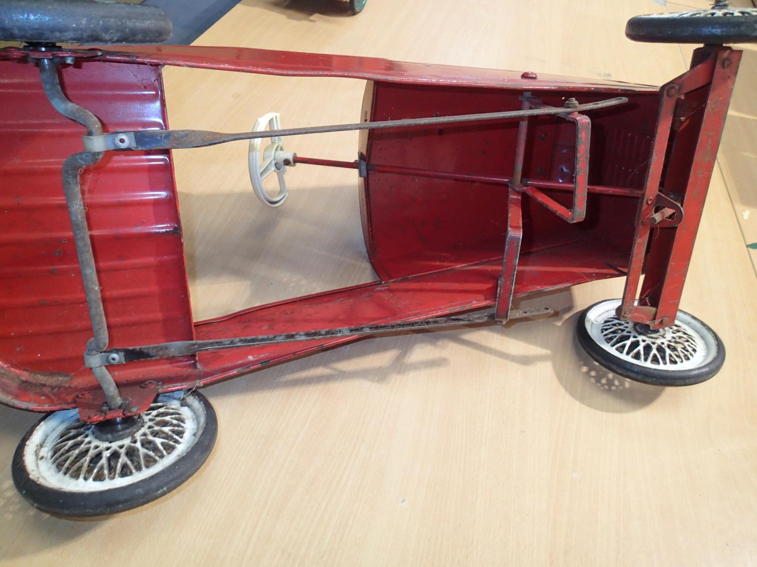 Vintage Triang peddle car, red, white wheels, working order, original condition, damaged steering - Image 5 of 5