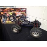 T Maxx Nitro Monster truck, no body shell, appears in good condition, requires transmitter,