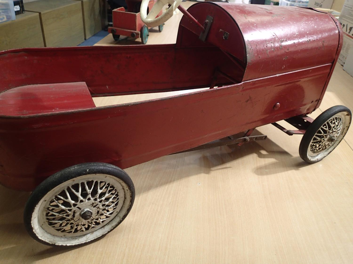 Vintage Triang peddle car, red, white wheels, working order, original condition, damaged steering - Image 3 of 5