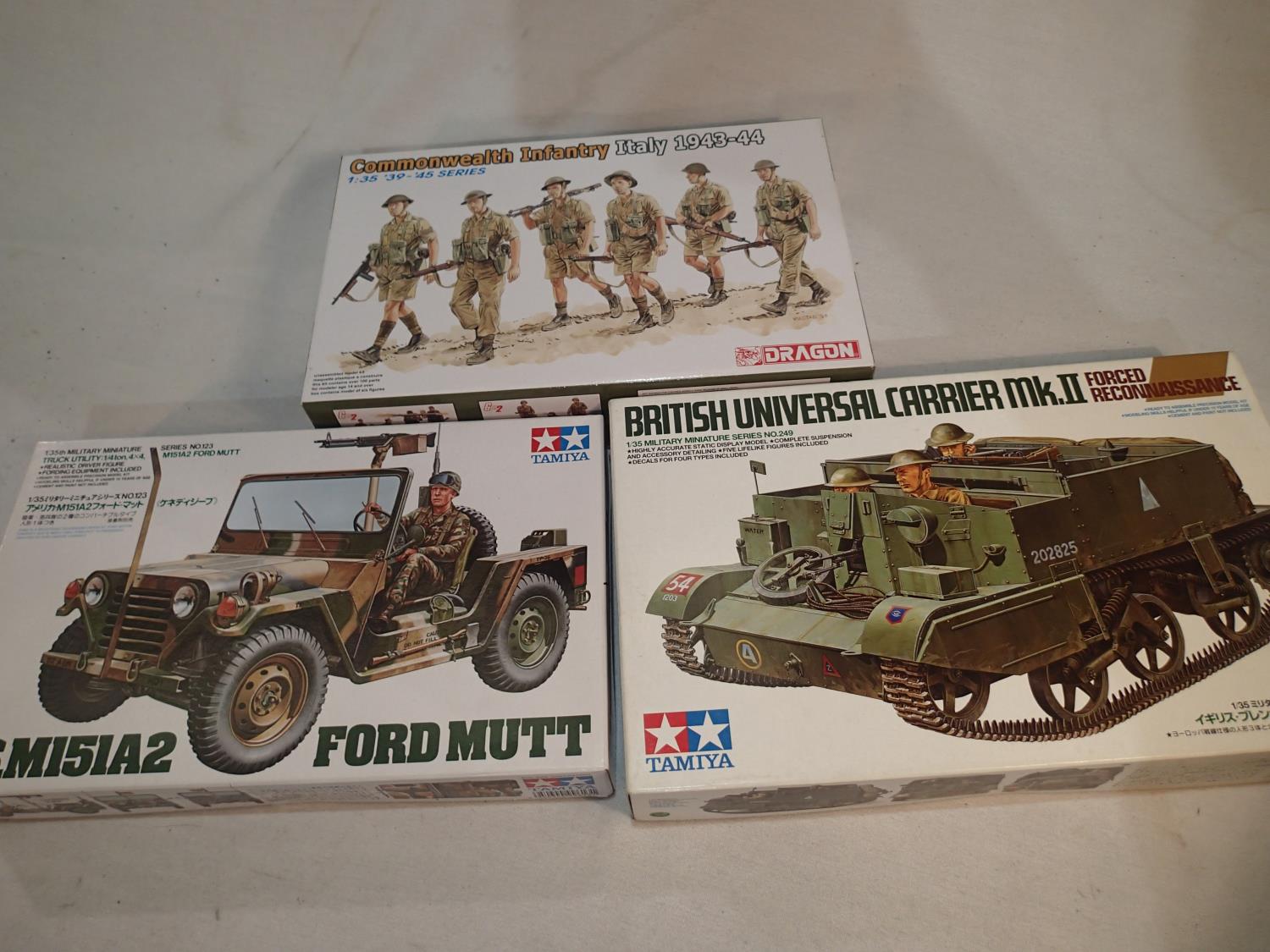 Three 1/35 scale military related kits, Tamiya Universal Carrier MKII, Tamiya Ford Mutt, and